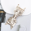 Sparkly gold glitter bow hair clip with cat ear and fishtail design for children - Bow / Gold