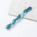 Macro detail of wave-shaped blue acetate hair clip with gold-tone metal duckbill base - Lake Blue Fine Stripes (E3228-6#)