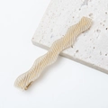 Macro detail of wave-shaped yellow resin hair clip with gold V-geometric patterns - Pale Yellow with Gold Geometric Pattern (E3220-8#)