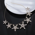 Diadema dorada elegante con siete estrellas incrustadas con circonitas brillantes - Dorado