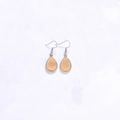 Detail of orange teardrop druzy earrings with sparkling texture and silver hooks - Silver Tone Orange