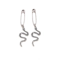 Gothic punk silver snake charms hanging from safety pin earrings with detailed scales - Snake