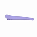 Close-up of a purple matte finish duckbill hair clip with a streamlined minimalist design - Purple