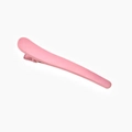 Matte pink duckbill hair clip in minimalist macaron style on white background - Pink
