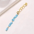 Detail of gold spiral hair ring with blue beaded charms in heart and star shapes - Heart Flower Long Style (E9421)