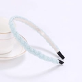 Close-up of light blue hand-beaded braided headband displayed on elegant teacup - Light Blue