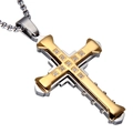 Macro detail of a dual-layered cross pendant with sparkling zircons and silver box chain - Gold Silver Knight Cross