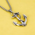 Vintage stainless steel anchor pendant necklace with rope detail on yellow background - Anchor Pendant with Chain