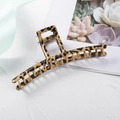 Haarklammer mit Leopardenmuster für Damen auf einem dekorativen Hintergrund - Brown Pattern