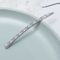 Elegant silver hair clip with rectangular zircons on a blue ceramic plate for women - Silver