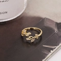 Elegant gold leaf-shaped open ring with sparkling zircon stones in an olive branch design - Gold Style (D7206)