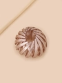 Detail of rose gold expandable nest hair clip showing metallic texture and mechanism - Rose Gold (E5215)