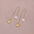 Detail view of gold chain earrings with smooth white pearls and yellow faceted gemstones - Yellow Gem Gold A1213
