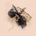 Elegant gold alloy shark clip featuring a large black mesh bow and white pearl tassel - Butterfly Style 2 (H3309)