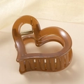 Elegant heart-shaped hair claw clip in translucent amber brown resin finish - Brown (B3402)