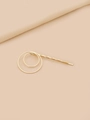 Detail view of double circle gold alloy hair clip with elegant wave design and metal finish - Gold