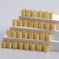 Set aus goldenen filigranen Metall-Haarringen mit Blumenmuster für Flechtfrisuren - Gold