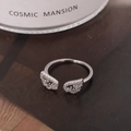 Elegant silver wing-shaped open ring with sparkling pavé cubic zirconia inlay - Silver