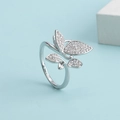 Micro-pave zircon butterfly open ring in silver finish on a clean blue background - Silver