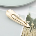 Minimalist gold metal teardrop hair clip with a sleek mirror finish on white paper - Gold (E3203)