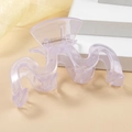 Elegant wave-shaped lavender hair claw clip made of translucent resin with metal spring - Purple