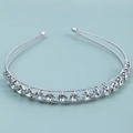 Close-up of double-row silver headband with sparkling rhinestones in four-prong settings - Silver Style (E4408)
