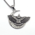 Detailed close-up of a vintage steel eagle and tribal moon pendant with a box chain - Moon Eagle Style