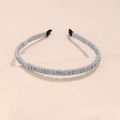 Close-up of light blue ruched fabric headband with premium pleated texture and comfort tips - Light Blue