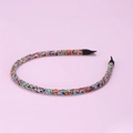 Detailed macro view of colorful handmade beaded thin headband with multi-colored micro beads - Colorful