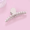 Detail view of large silver metal hair claw clip with elegant white pearls and rhinestones - Rhinestone Pearl Silver