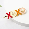 Colorful XOXO letter hair clip with enamel finish on a golden alloy minimalist base - XOXO Word Style (C5405)