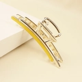 Detailed macro view of yellow enamel inlay on a golden minimalist metal hair claw clip - Yellow (C5107)