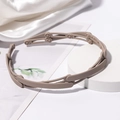 Foldable matte khaki hairband with non-slip teeth and compact retractable structure - Coffee