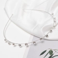 Close-up of elegant silver headband with 11 sparkling rhinestones in a claw setting - Silver Style (C7534)