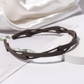 Foldable matte brown plastic headband with anti-slip teeth in a portable design - Gray