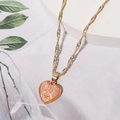 Elegante Halskette mit pfirsichfarbenem Herzanhänger und goldener Kette mit Perlenrand - Dunkelrosa D3323