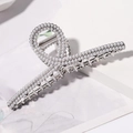 Detail of silver metal hair claw clip with pavé white pearls and ring-shaped handle - Cross Artificial Pearl Silver