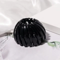 Detail of black bird nest hair clip with retractable claws and smooth glossy finish - Bird's Nest Retractable Design / Black (E5216)