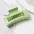 Large light green rectangular hair claw clip with glossy finish for thick hair styling - Green