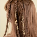 Detailed view of vintage gold spiral hair clips and pendants styled on brown braided hair - Vintage Key Lock Pendant Style (E7522)