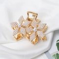 Detailed close-up of a golden alloy hair claw featuring elegant dual pearl flowers - Flower Pearl Style (E7421)