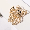 Eleganter Goldbären-Haarclip aus Metall mit schwarzen Perlenaugen auf weißem Block - Bär (Schwarzes Auge) / Gold