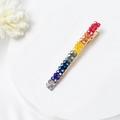 Detailed macro shot of a rainbow crystal hair clip with a gold-tone alloy duckbill base - Barrette Style (E4103)