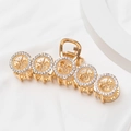 Elegante pinza per capelli in metallo dorato con strass a forma di stella per donna - Stile Quattro Anelli con Strass (B8511)