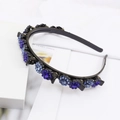 Detail of blue rhinestone sunflower headband with integrated hair clips for styling - Blue (E6132)