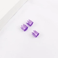 Three purple aluminum crown dreadlock beads with embossed patterns on a white platform - Purple