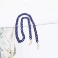 Close-up of blue marble acrylic glasses chain with gold lobster clasps and rubber loops - Deep Blue Marble (K3407)