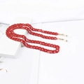 Detail of red marble texture acrylic eyewear chain with golden lobster clasps - Red Marble (K3403)