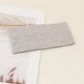 Detail of grey ribbed knit headband showing soft texture and elastic fabric for yoga - Light Gray
