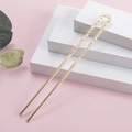 Forcina per capelli dorata a forma di U con motivi vintage su espositori bianchi a piani - Stile Oro (B2306)